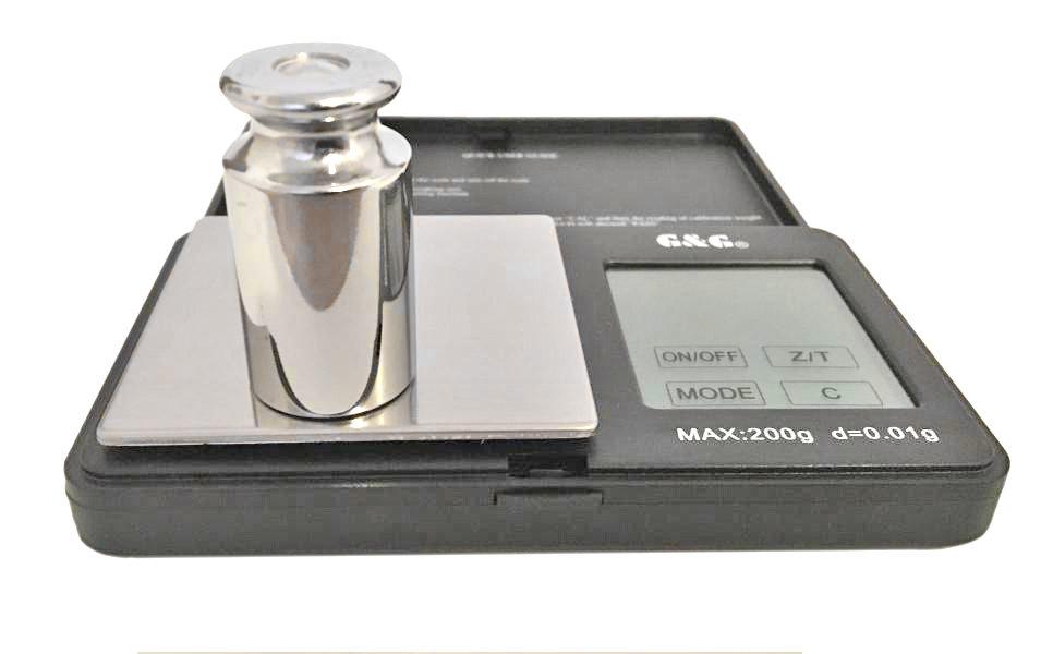Taschenwaage mit Kalibriergewicht